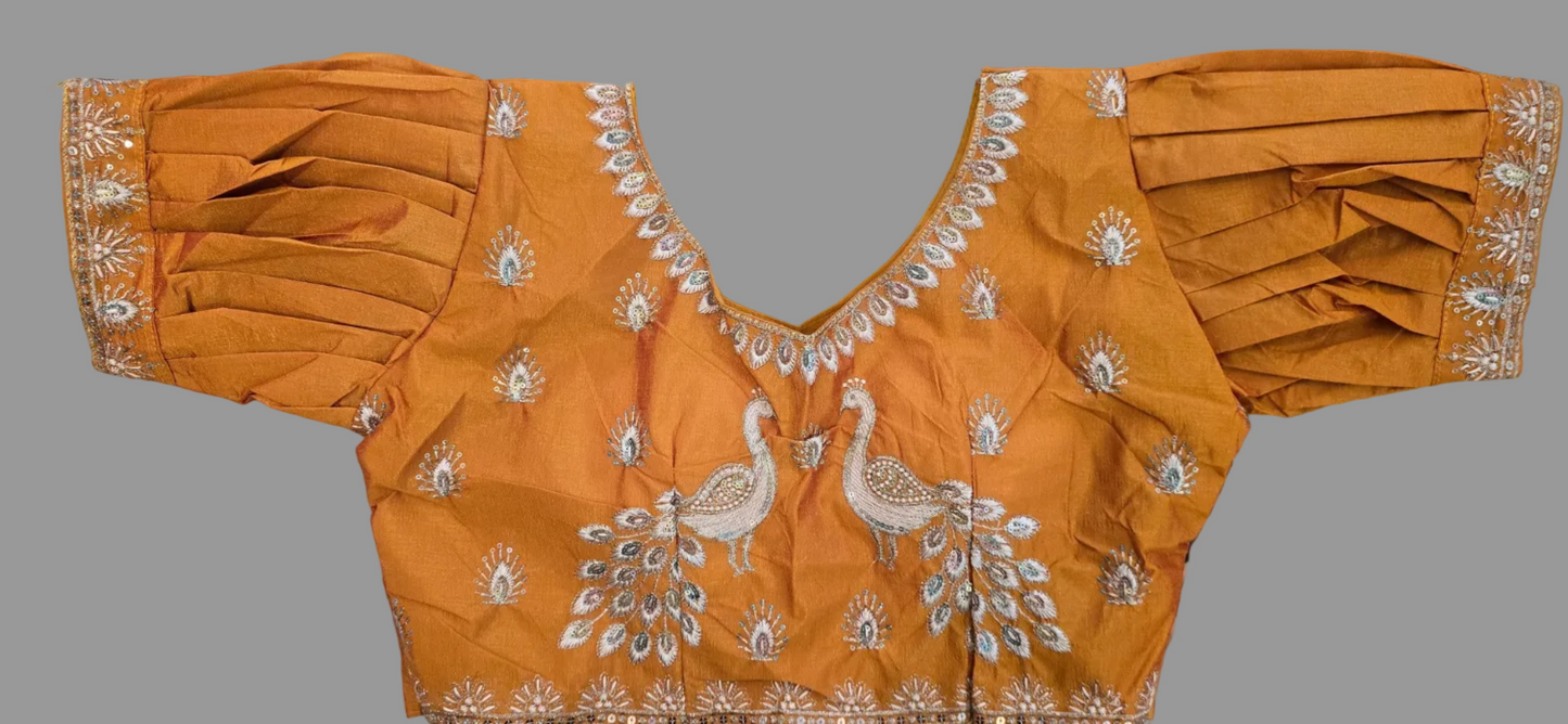 Orange saree with puffed sleeves blouse