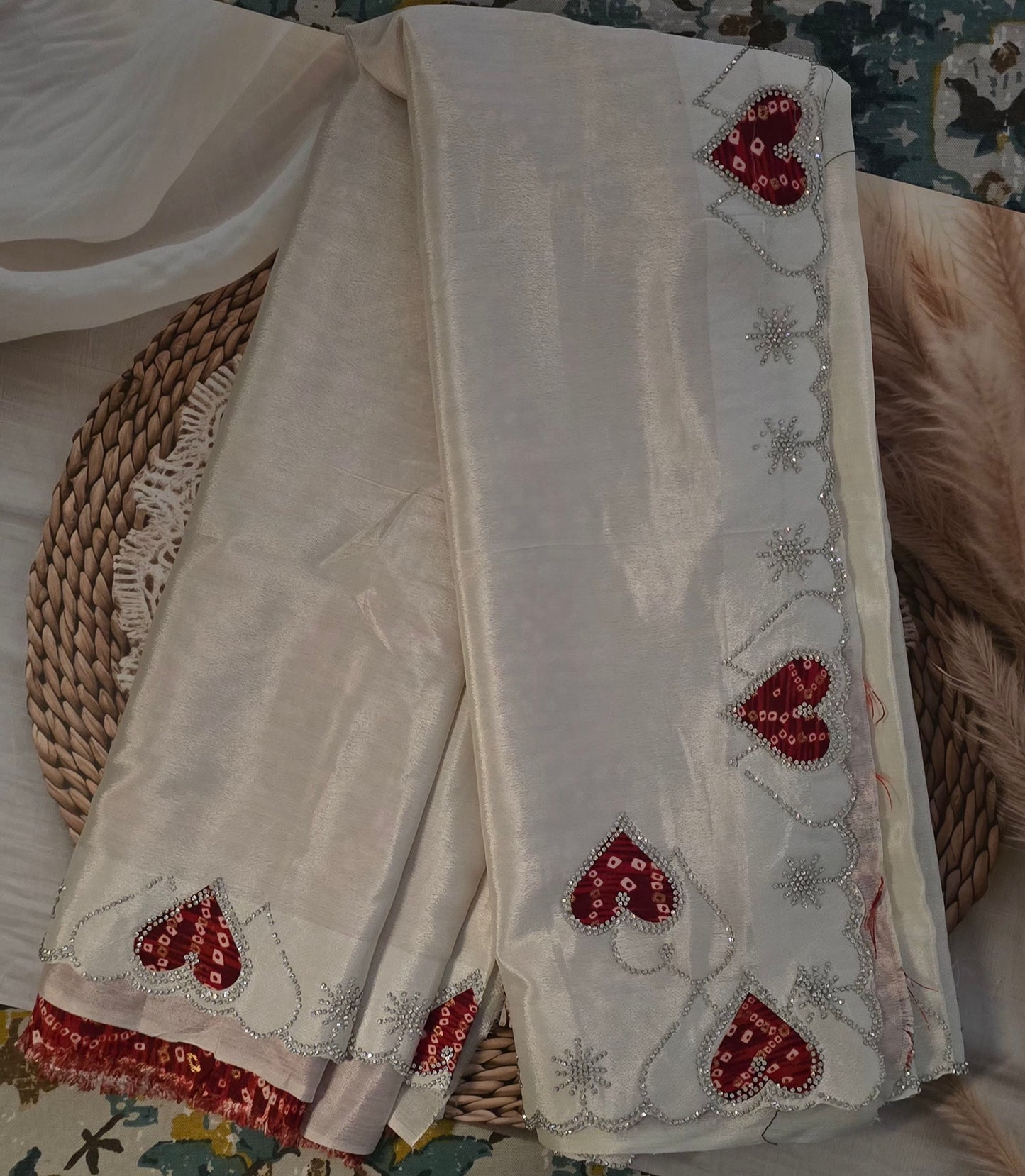 Cream heart pattern saree with bandhej blouse