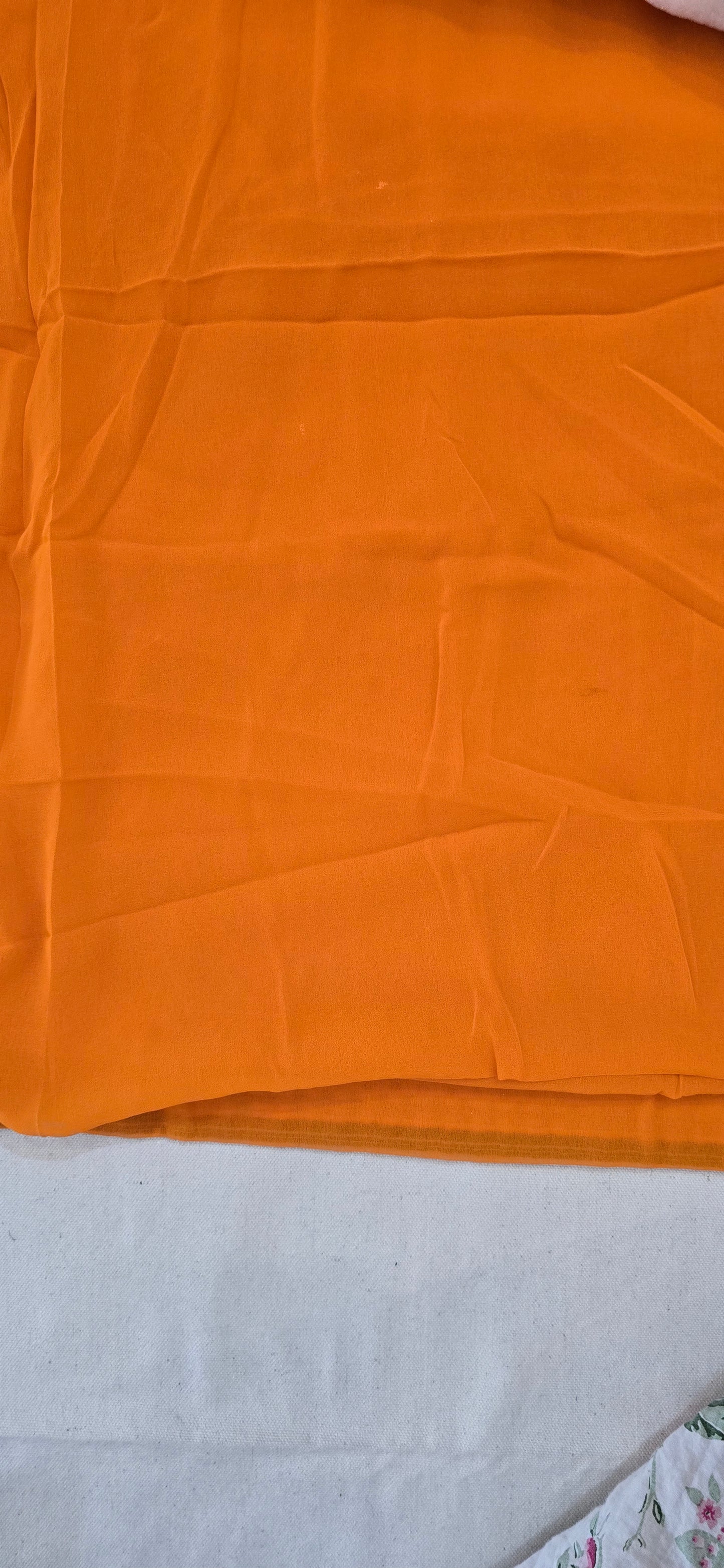 Orange Georgette full jarkan work with embroidered lace border