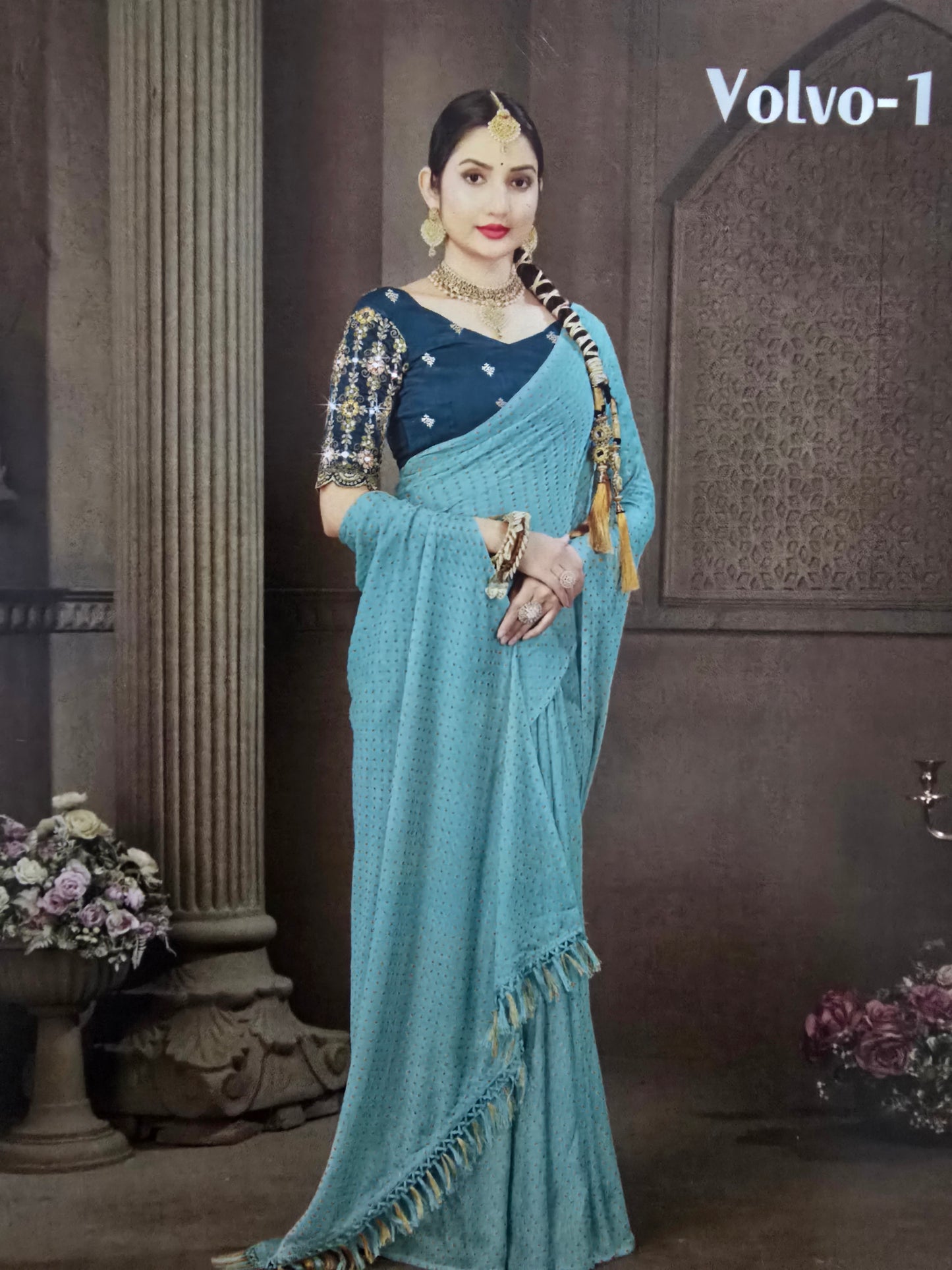 Aqua Green Georgette Saree with embroidered blouse