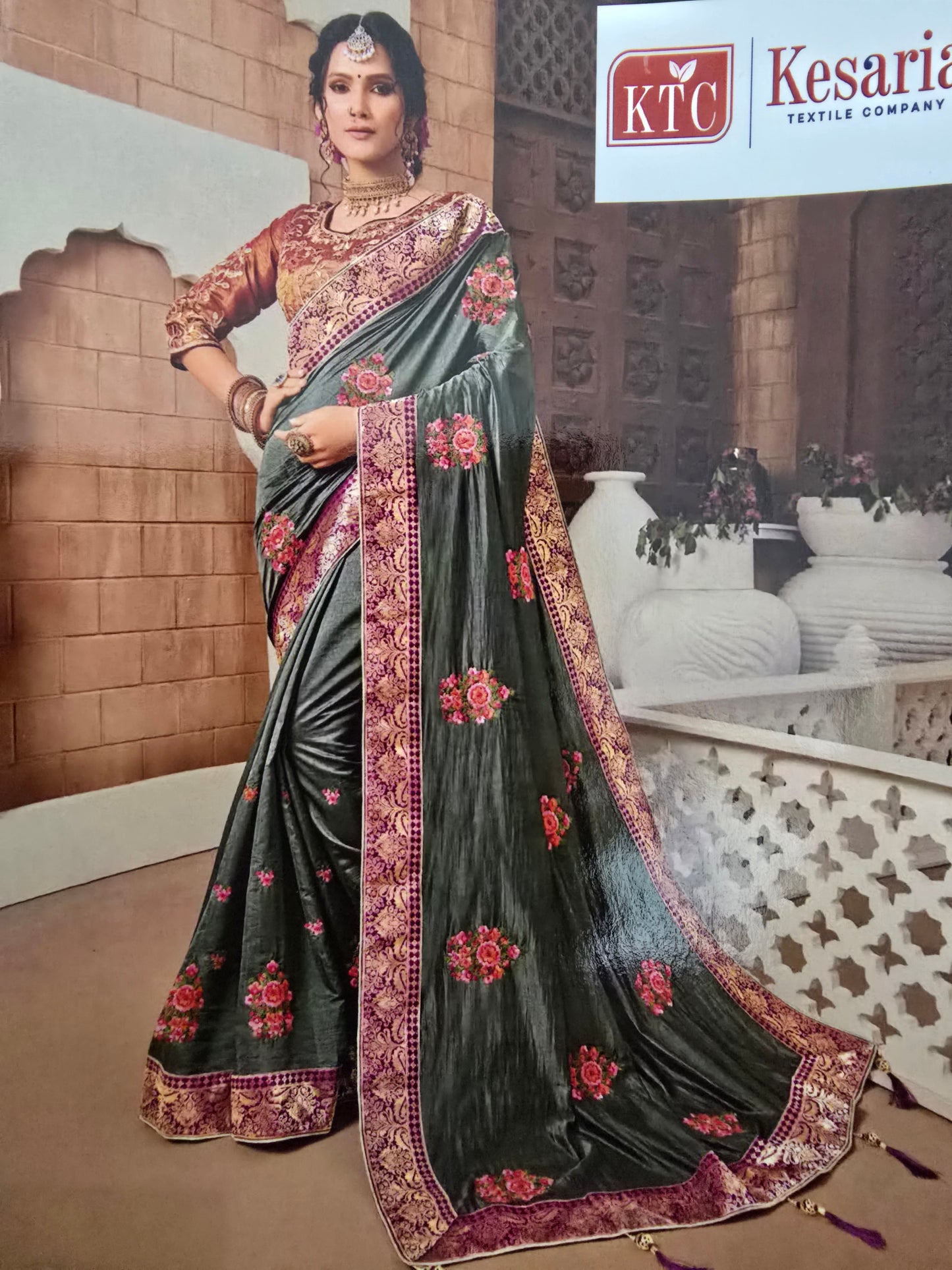 Olive green silk saree with contrast readymade embroidered blouse
