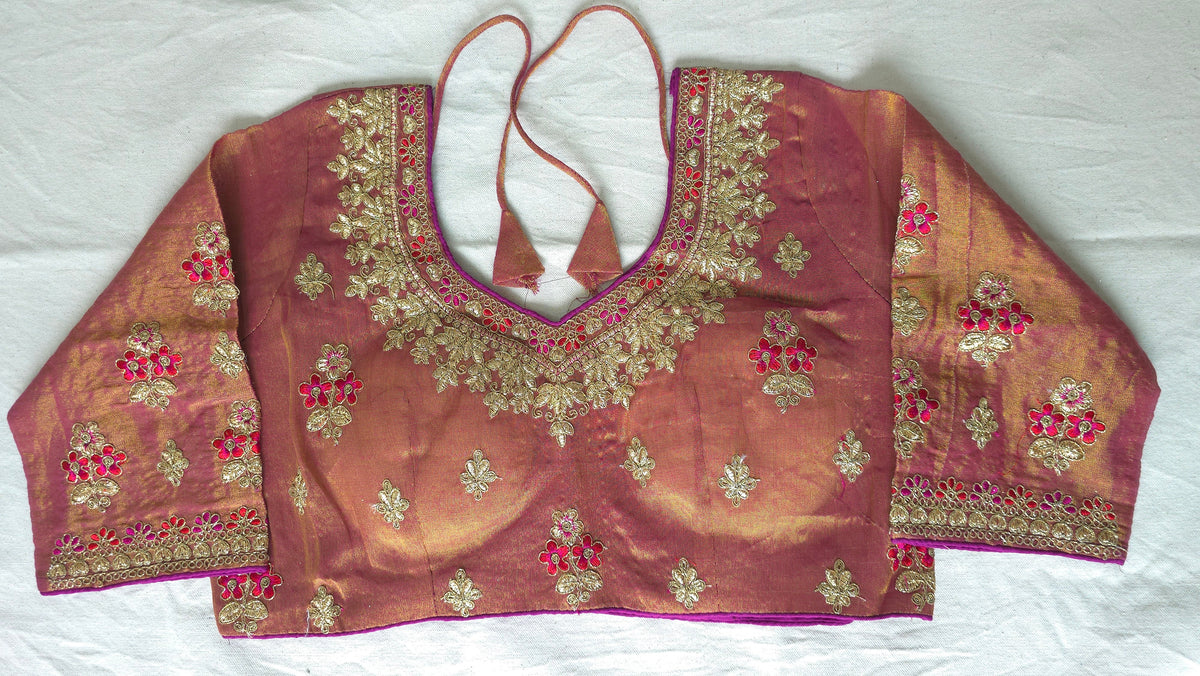 Metallic silver silk saree with contrast readymade embroidered blouse
