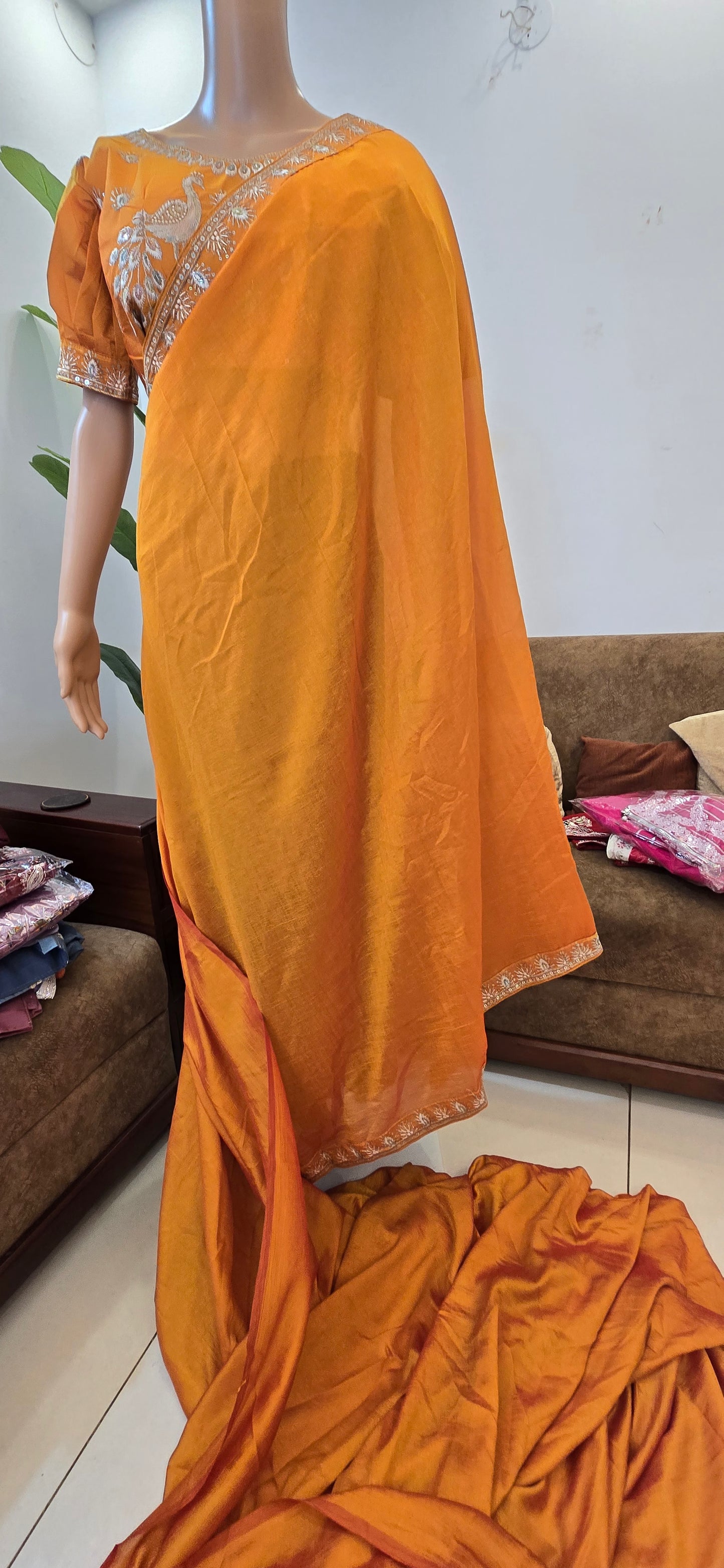 Vichitra Fabric Orange colored saree with puffed peacock design ready blouse