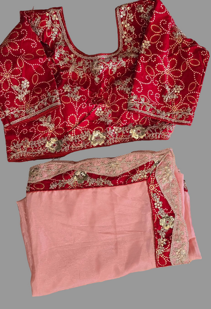 Pink scalloped saree with Red blouse