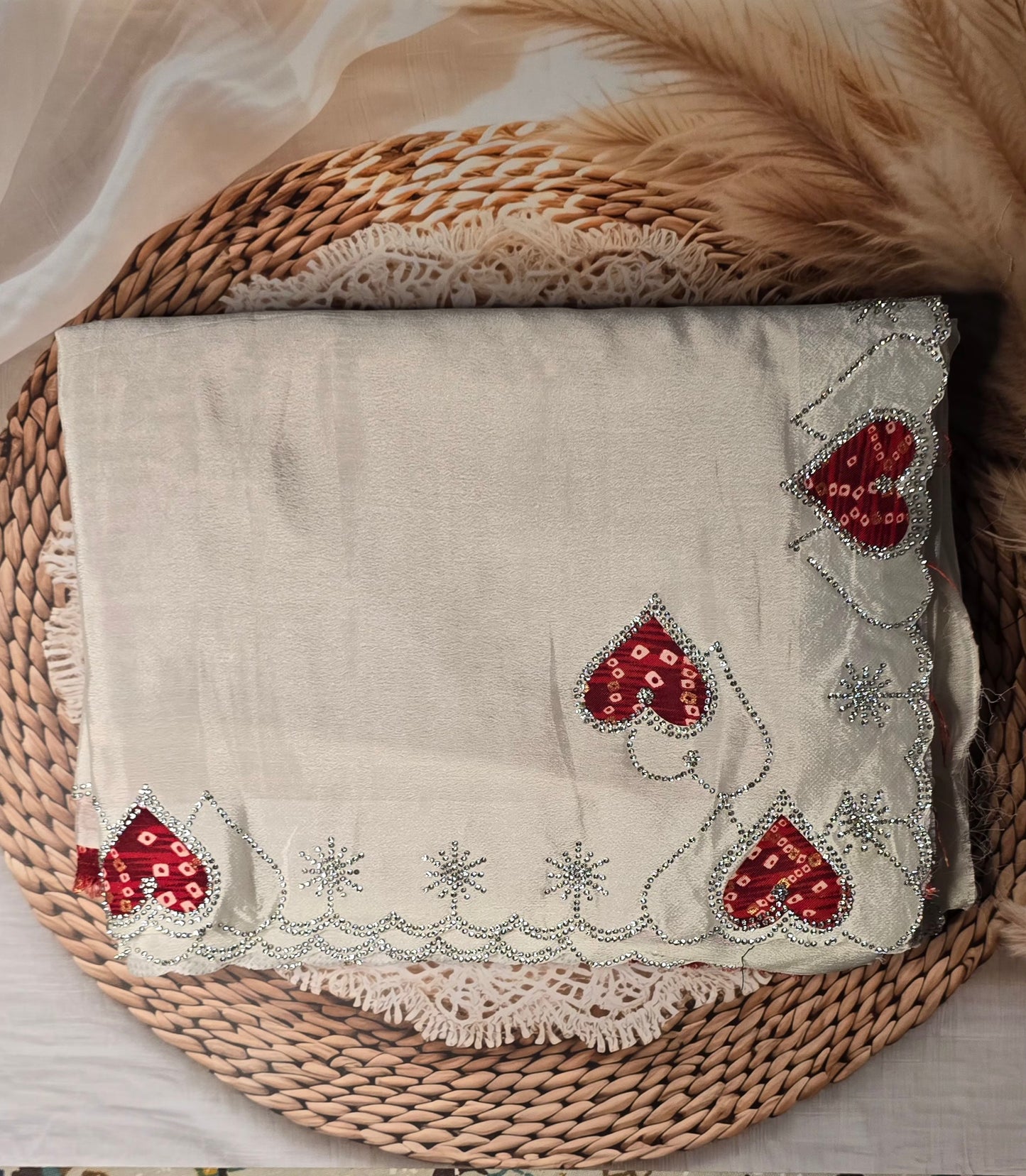 Cream heart pattern saree with bandhej blouse