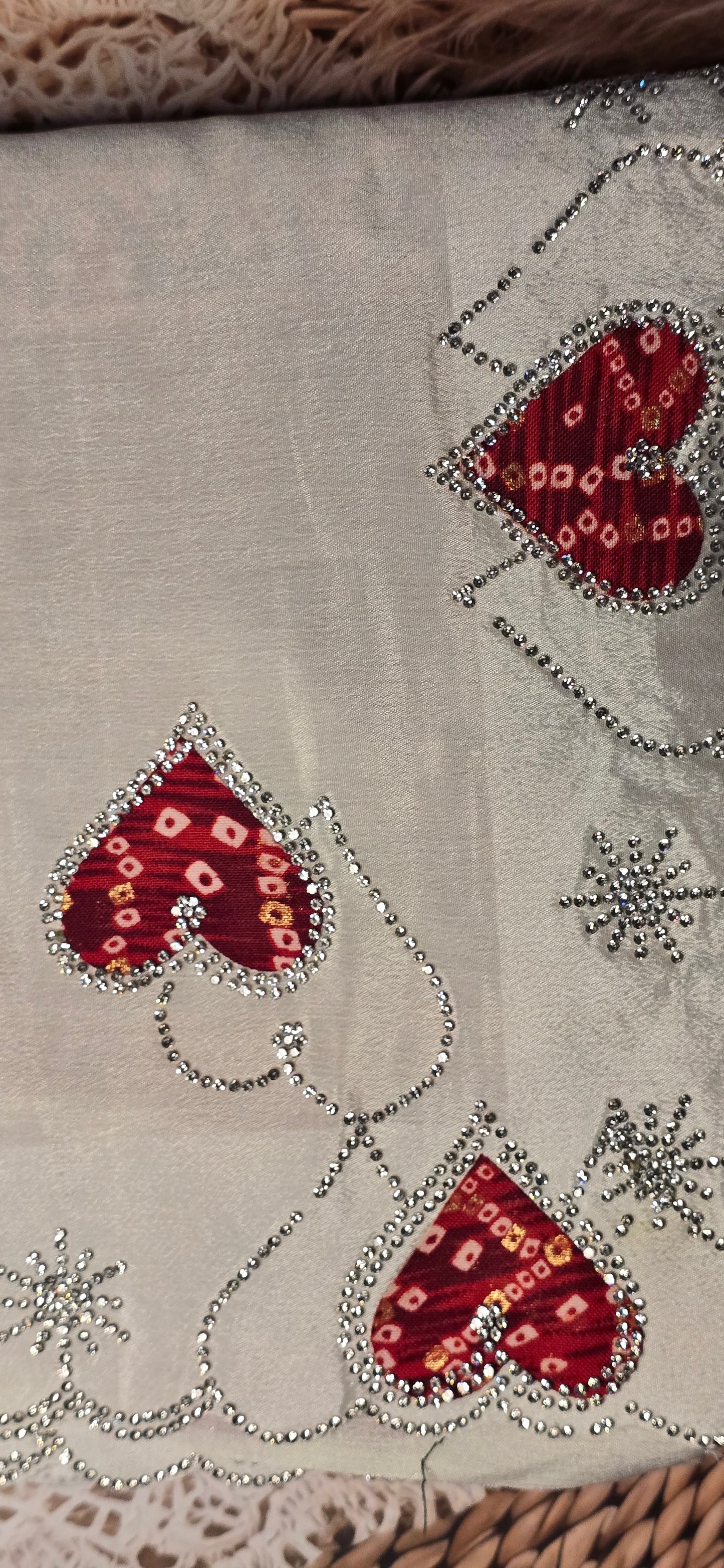 Cream heart pattern saree with bandhej blouse