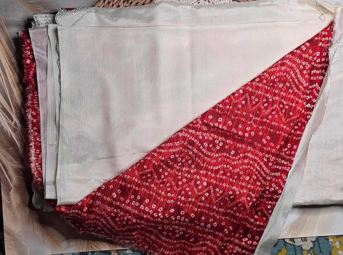 Cream heart pattern saree with bandhej blouse