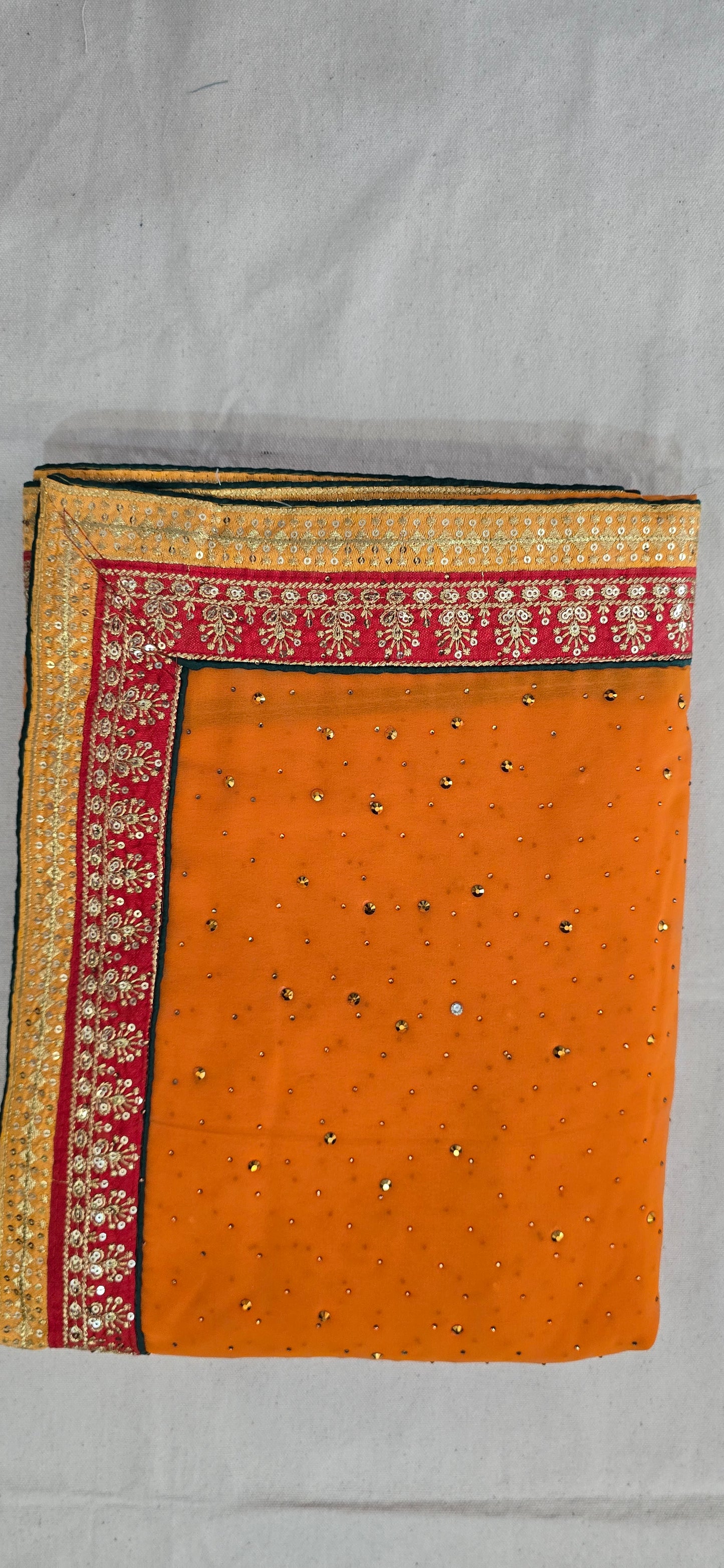 Orange Georgette full jarkan work with embroidered lace border