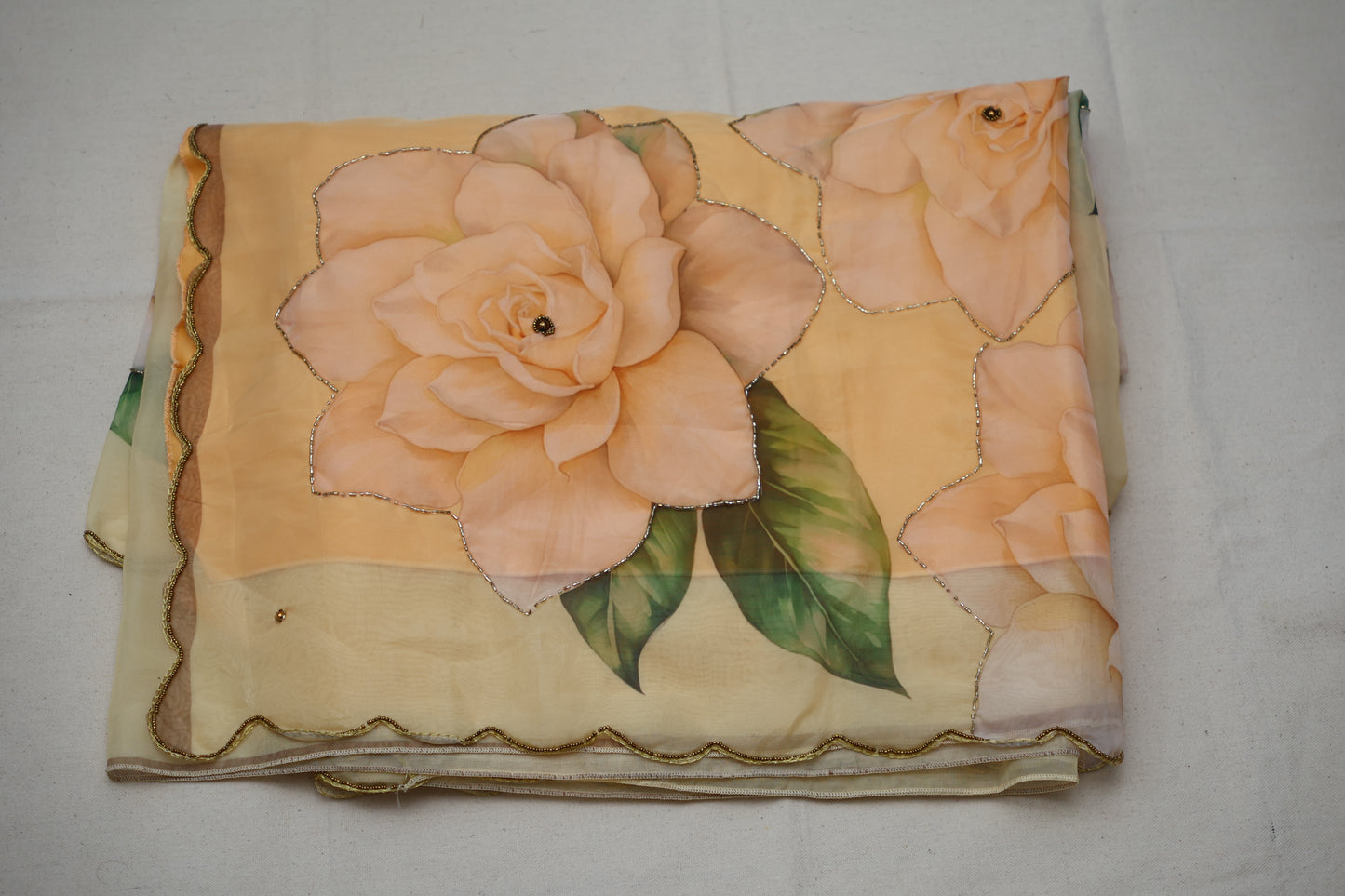 Peach embroidered print organza Saree