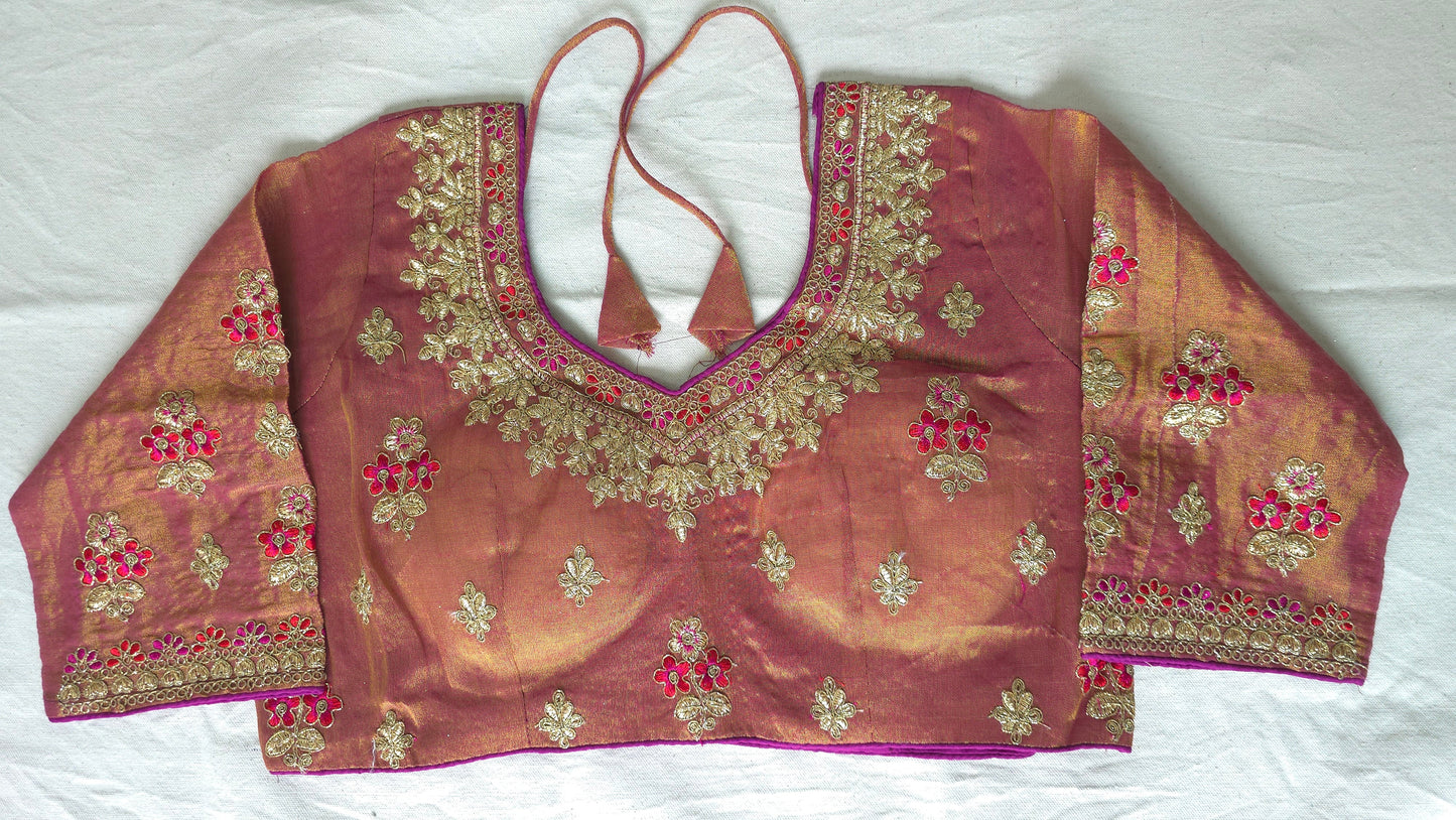 Metallic silver silk saree with contrast readymade embroidered blouse